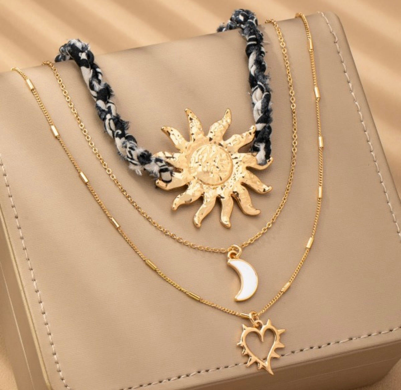 Charm necklace triple layer sumburst heart